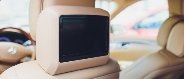 Video monitor installed into the headrest of the driver side seat